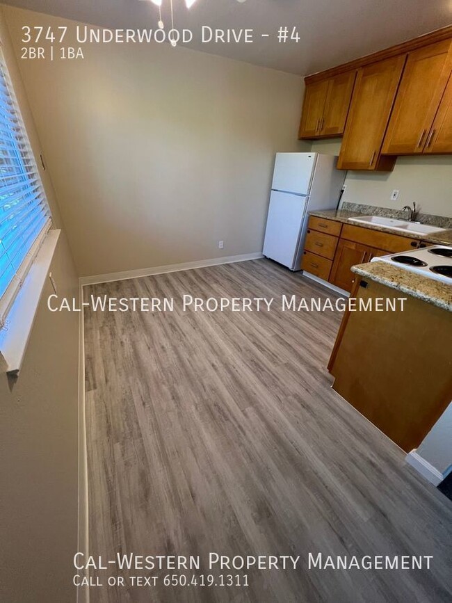 Building Photo - Remodeled Kitchen- Bright Upstairs 2/1 at ...