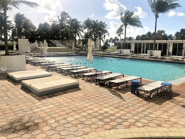 Building Photo - 10275 Collins Ave