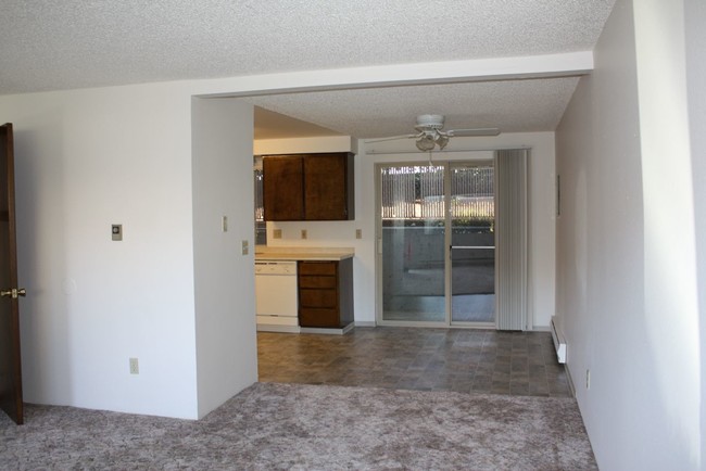 Living room, dining room, kitchen - Cascade Vista Apartments