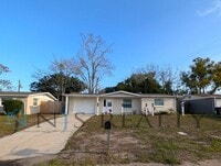 Building Photo - Fabulous 3/1/1 980 Sq. Ft. with NEW AC, NEW flooring, UPDATED kitchen & bath with GRANITE counter...