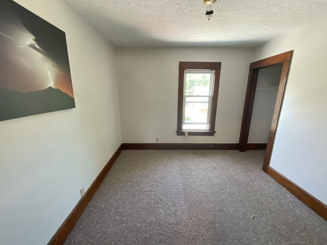 Building Photo - One Bedroom, Upstairs Duplex