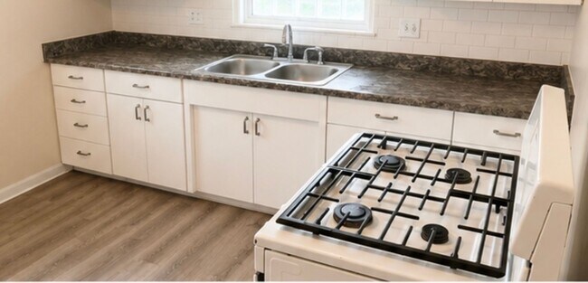 Building Photo - Charming 3-Bedroom Home with Hardwood Floors, Garage & Private Patio