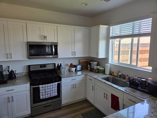 Building Photo - Coming in June!       Spacious 4 Bedroom Home in Bellemont | Fenced Backyard + 2 Car Garage