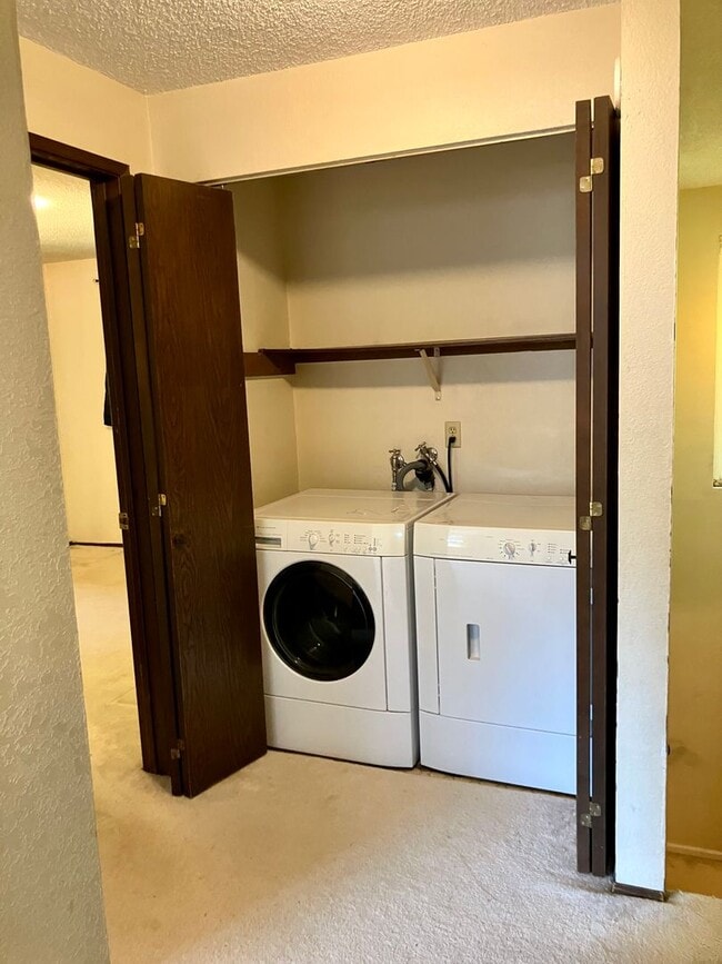 Building Photo - Spacious 2-Bed, 1.5-Bath Home with Firepla...