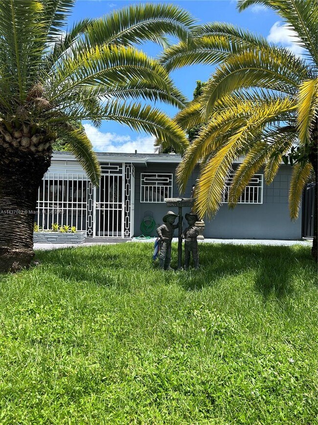 Building Photo - 5891 W 9th Ln