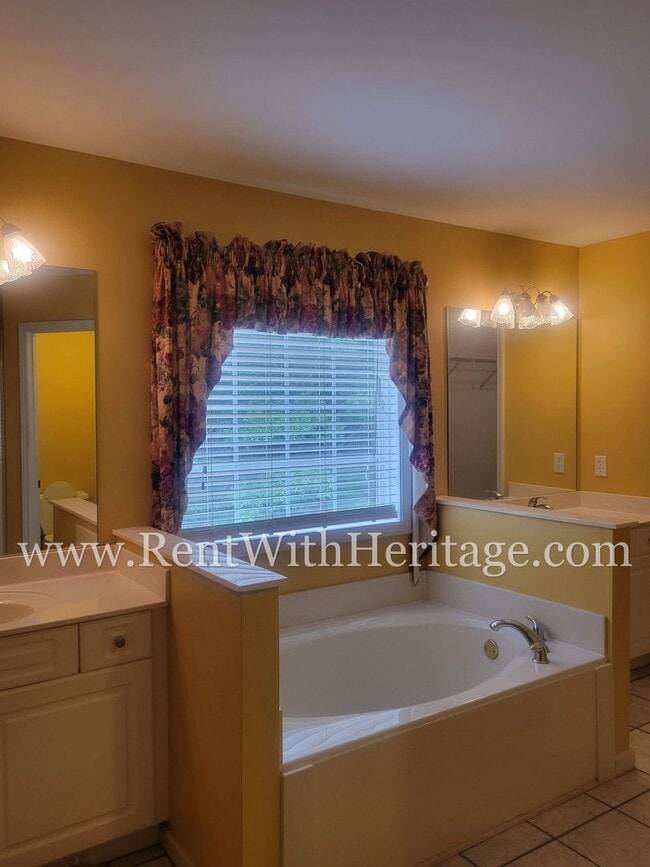 Building Photo - Gorgeous 3-Story Brick Home / 2 Fireplaces / Full Finished Basement / Chapel Hill Schools