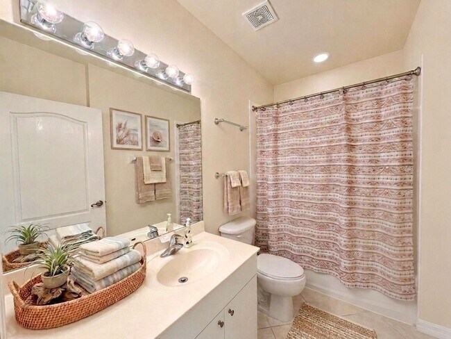 Building Photo - AVAILABLE NOW! Top-Floor Condo | Gated Community | Preserve Views | Water, Sewer & Cable Included