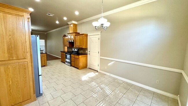 Building Photo - Spacious Stonegate Retreat with Home Office & Outdoor Living