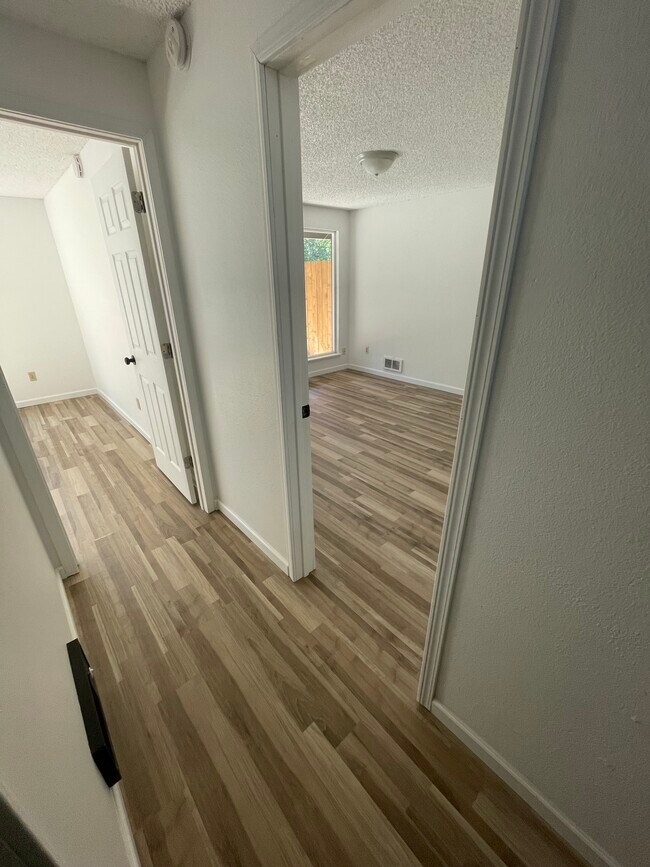Hallway to bedrooms - 1922 87th Avenue Ct W