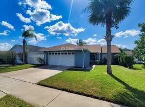 Building Photo - Charming 3-Bedroom Home with Pool, 2-Car Garage, and Tile Flooring Throughout!