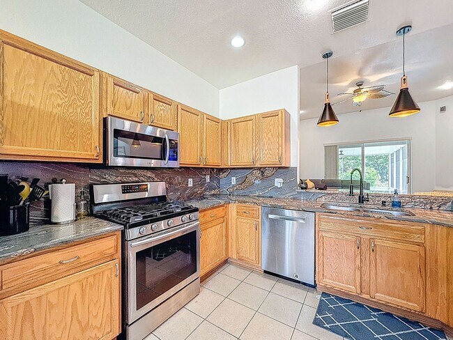 Building Photo - Now for Rent – Spacious 4-Bedroom Home in ...