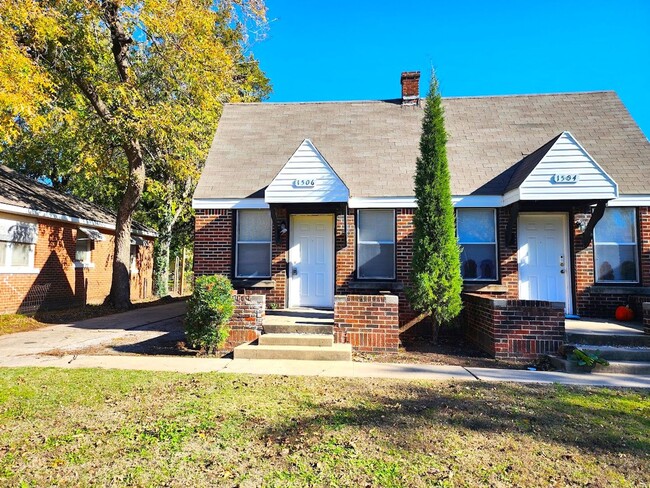 Building Photo - Charming Duplex in Shartel Blvd Addition