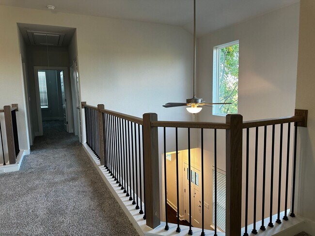 Building Photo - For Lease – Modern 2023 Condo Backing to Greenbelt | Creekside at Pioneer Crossing West