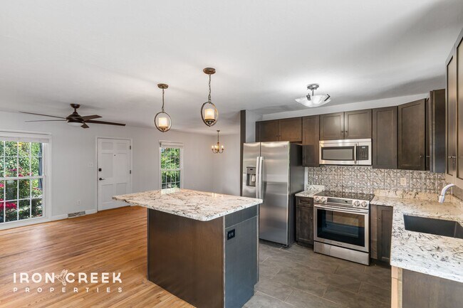 Building Photo - Beautifully Updated Three-Bedroom with Koi...