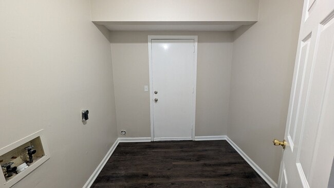 Building Photo - Fenced Yard, Lots of Light, Hard Floors Throughout