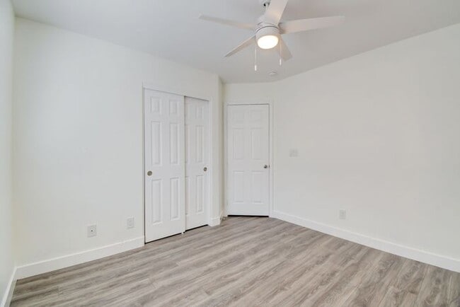 Building Photo - Great home with 4 bedrooms, 2.5 baths. New Floors Paint and Countertops.