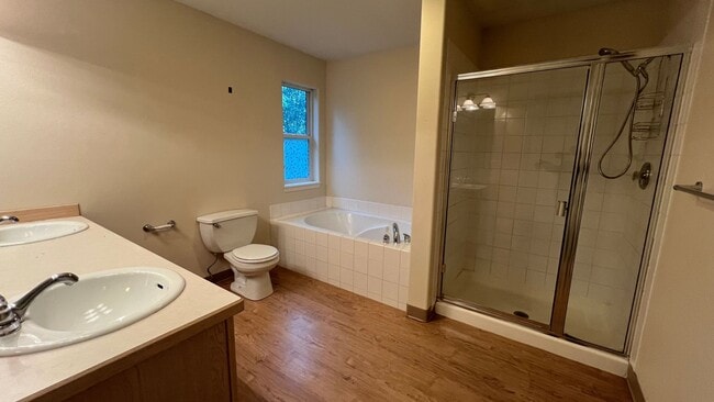 Building Photo - A spacious (4) Bedroom, (2.5) Bathroom hom...
