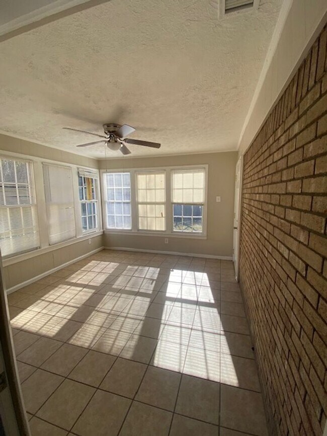 Building Photo - A Quiet Location, $200 Move-N-Special