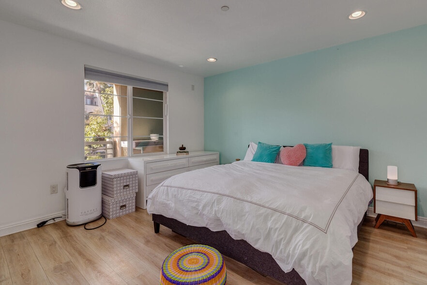 Master Bedroom with 2 Walk-in Closets and Upstairs Patio - 5831 Seawalk Dr