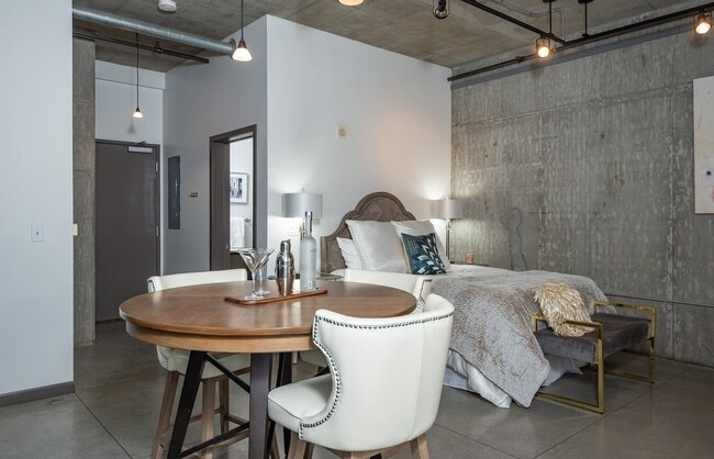 Building Photo - Rare Availability in the Streetcar Lofts, Parking, and Some Utilities Included