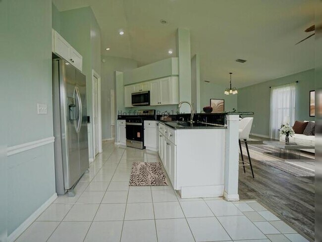 Building Photo - Charming 3 Bed, 2 Bath Home with Pond View in Sought-After Community