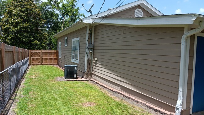 Side yard - 112 N Division St