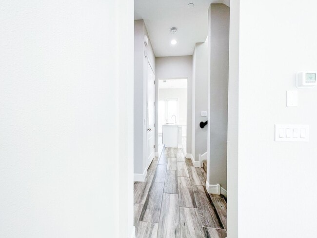 Building Photo - Luxury 4-Bedroom Townhome in Laureate Park – Now Available!