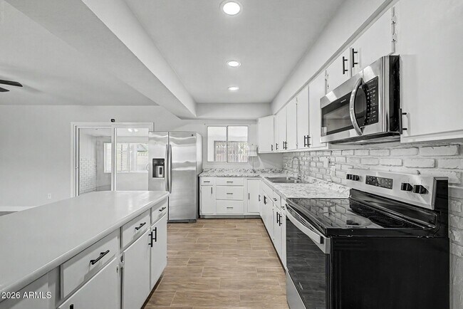 Building Photo - 6536 W Turney Ave