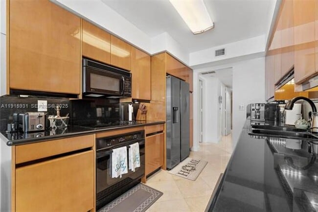 Building Photo - 18671 Collins Ave