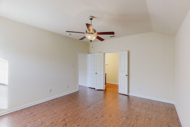 Building Photo - Spacious and Welcoming 4-Bedroom Home with...