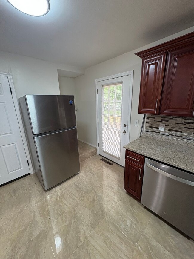 Building Photo - 3 Bedroom / 2 Bath Rennovated Home / Large Fenced Yard / Brand-New Multi-Level Deck