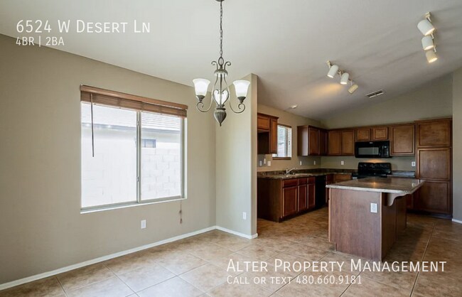 Building Photo - 6524 W Desert Ln