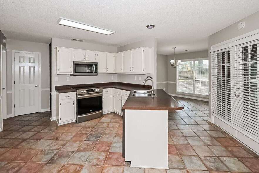 Building Photo - 5759 Michaelson Dr