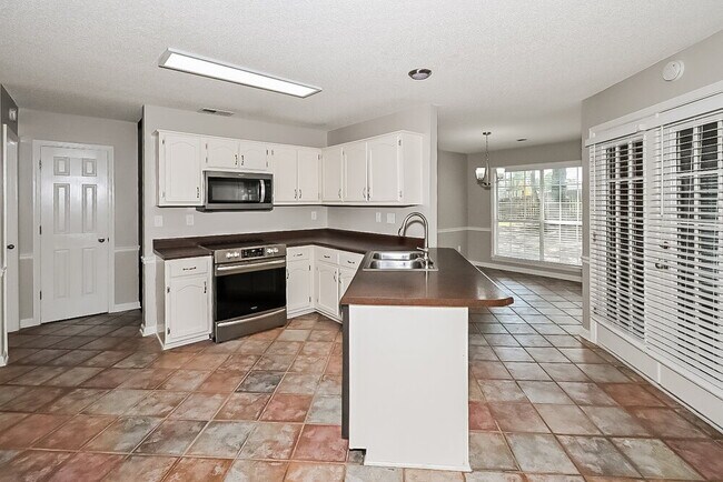 Building Photo - 5759 Michaelson Dr