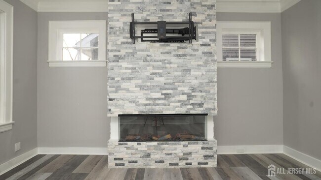 Building Photo - 65-65 Poe Ave