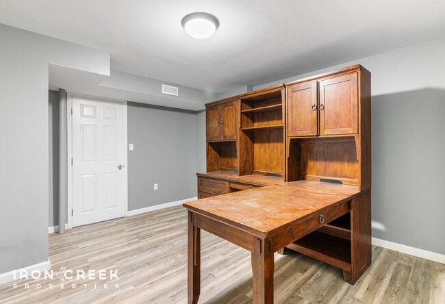 Building Photo - Beautifully Updated Three-Bedroom with Koi...