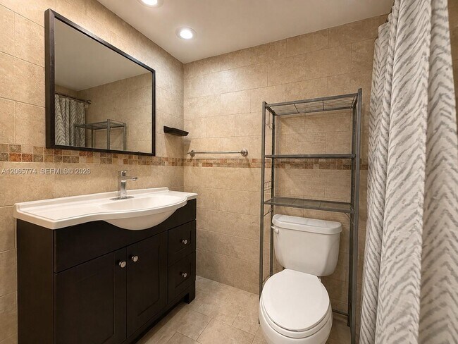 Building Photo - 5401 Collins Ave