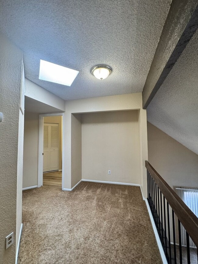 Building Photo - ***MOVE IN SPECIAL*** 2 STORY TOWNHOME WITH ATTACHED GARAGE WATER INCL