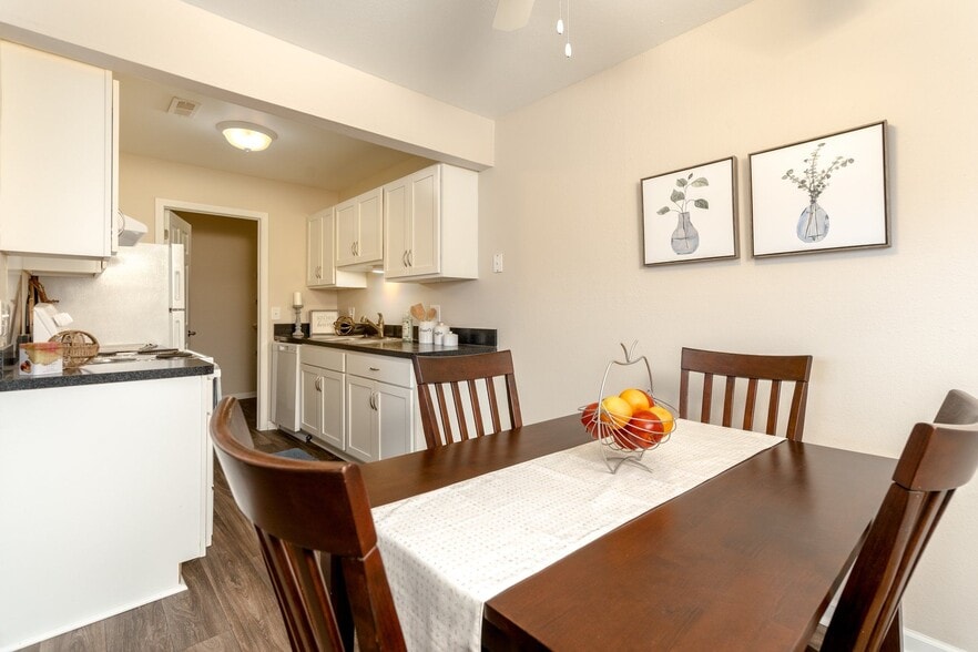 Cozy Dining Room and Kitchen at Three Oaks - Three Oaks Apartments