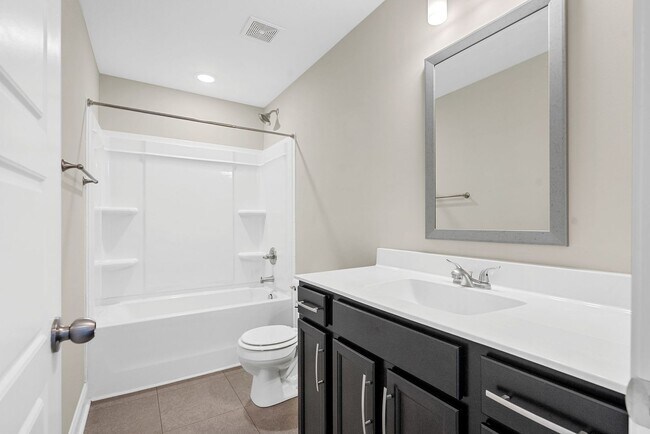 Building Photo - Pet Friendly Three Bedroom with Bonus!