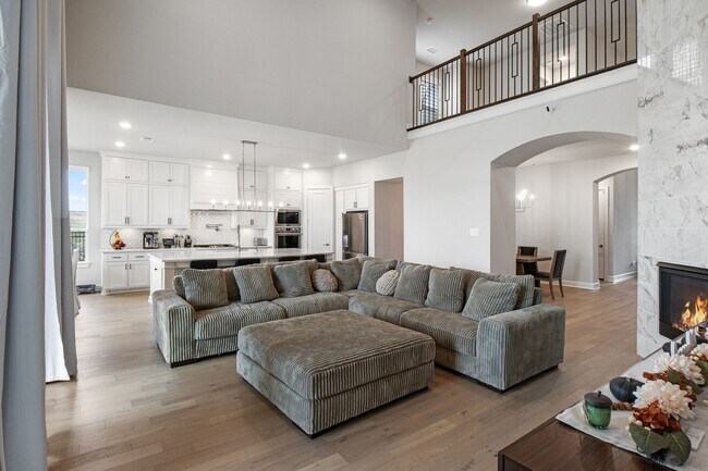 Building Photo - Stunning 4-Bedroom Luxury Residence with Bonus Office in the Prestigious Walsh Community LIKE NEW!