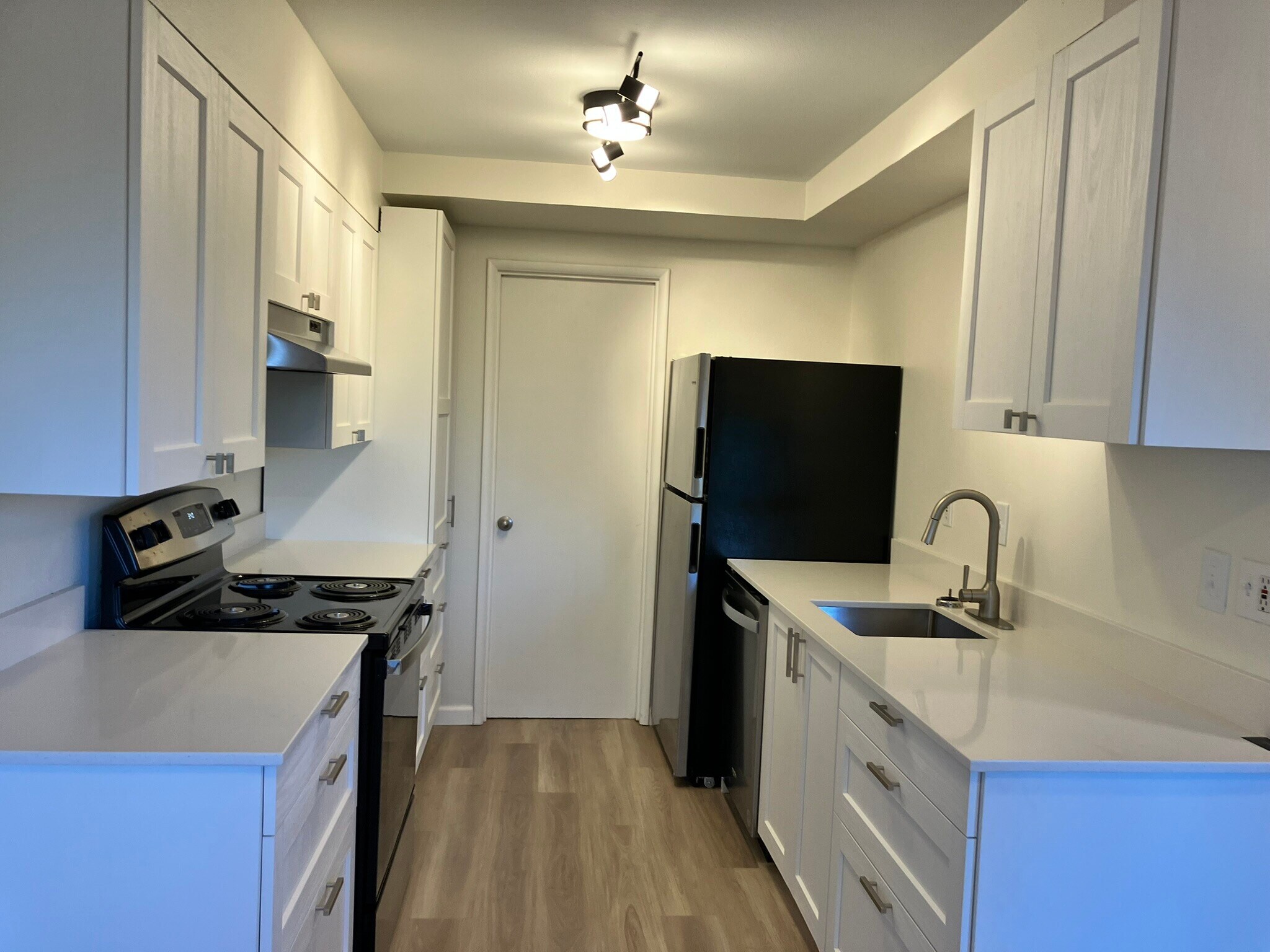 Kitchen with new appliances, countertops, and cupboards - 3022 SW 12th Ave
