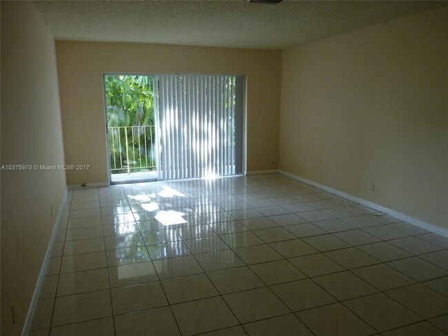 Building Photo - 3100 Coral Springs Dr