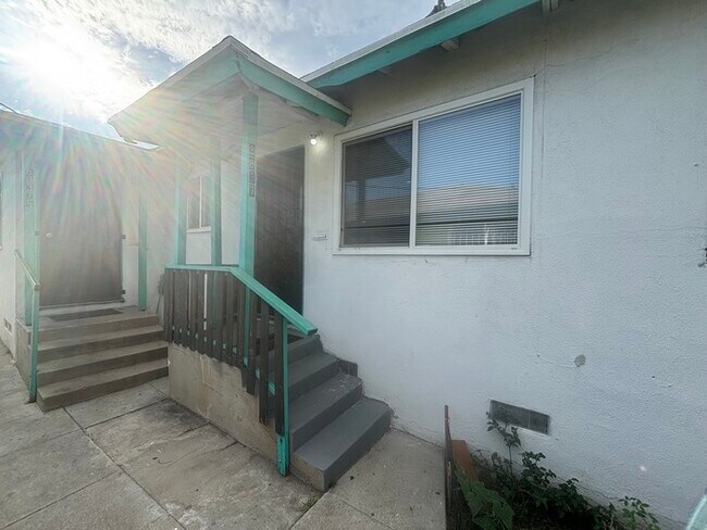 Building Photo - 8837 S Hoover St