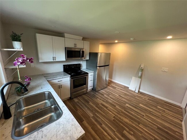 Building Photo - 1006 E 26th Ave