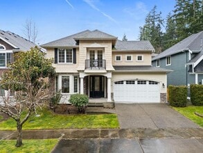 Building Photo - Elegant University Place Home with A/C, Tandem Garage, Office & Balcony Bedroom Near JBLM!