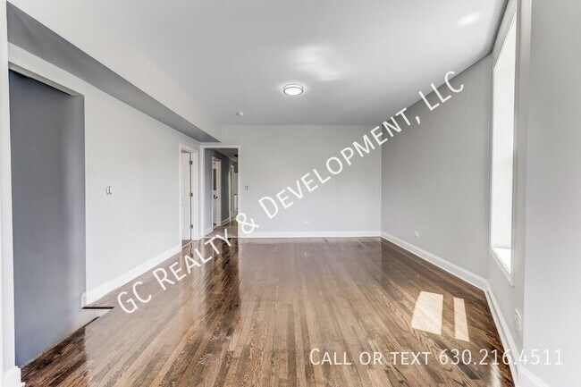 Building Photo - 6433 S Vernon Ave