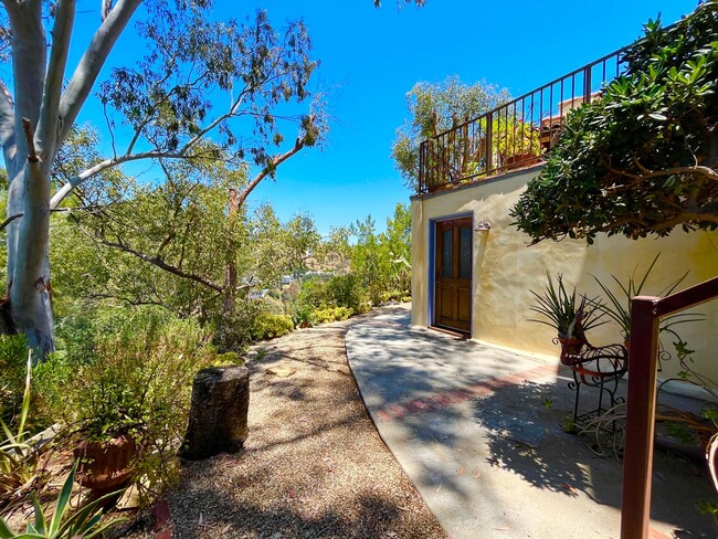 Building Photo - Excellent two Story Spanish style home located just minutes away from Sunset Strip