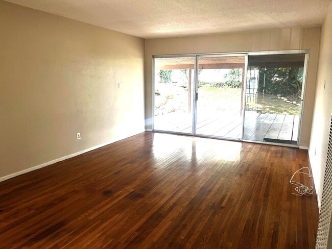 Building Photo - 2BR 1BA Allied Gardens Home - Hardwood Floors, Washer/Dryer, 2 Car Garage, HUGE backyard, 2 Pets ...