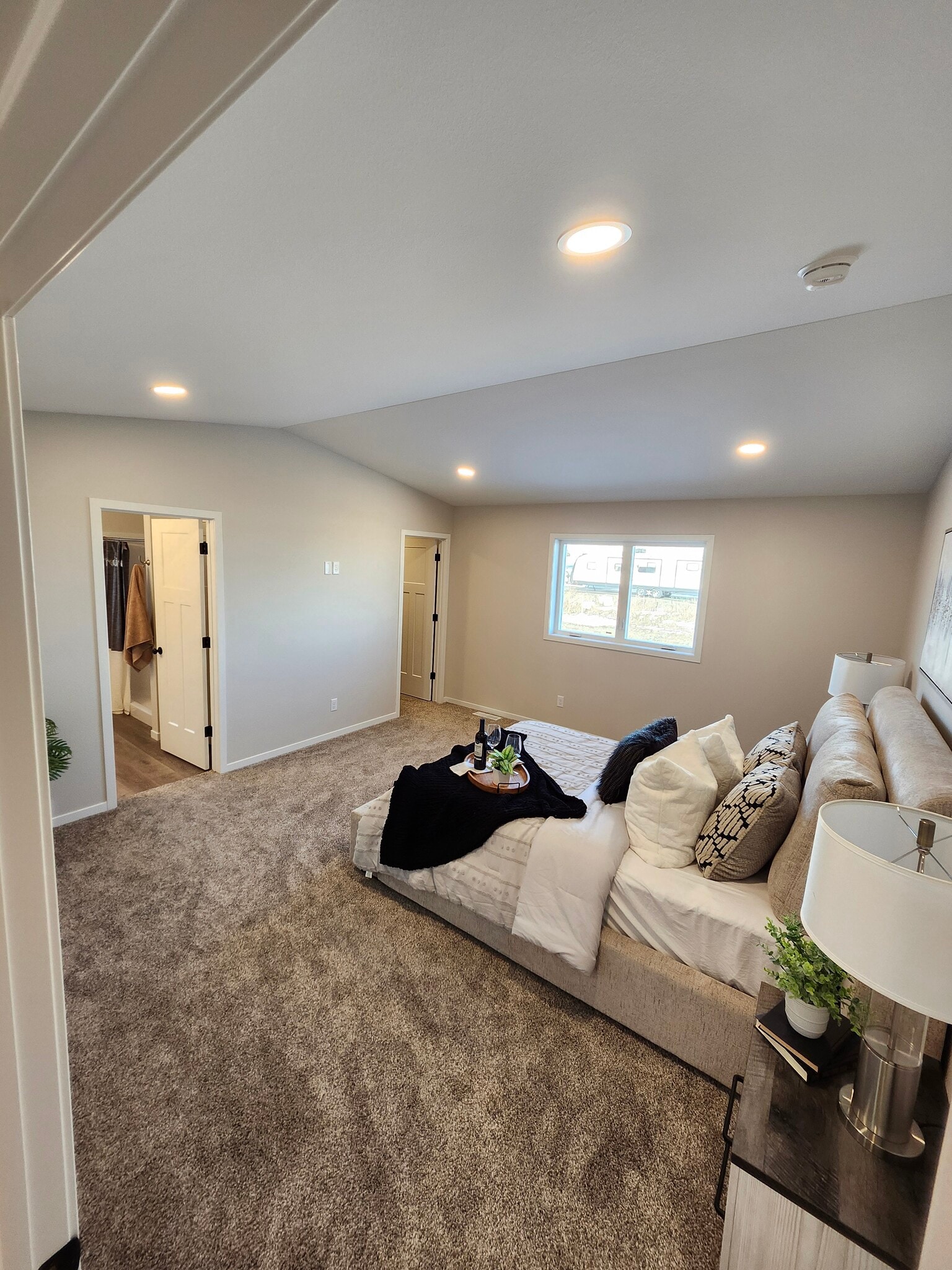 Extra large primary bedroom looking to closet and bathroom - 5316 Welder Ave